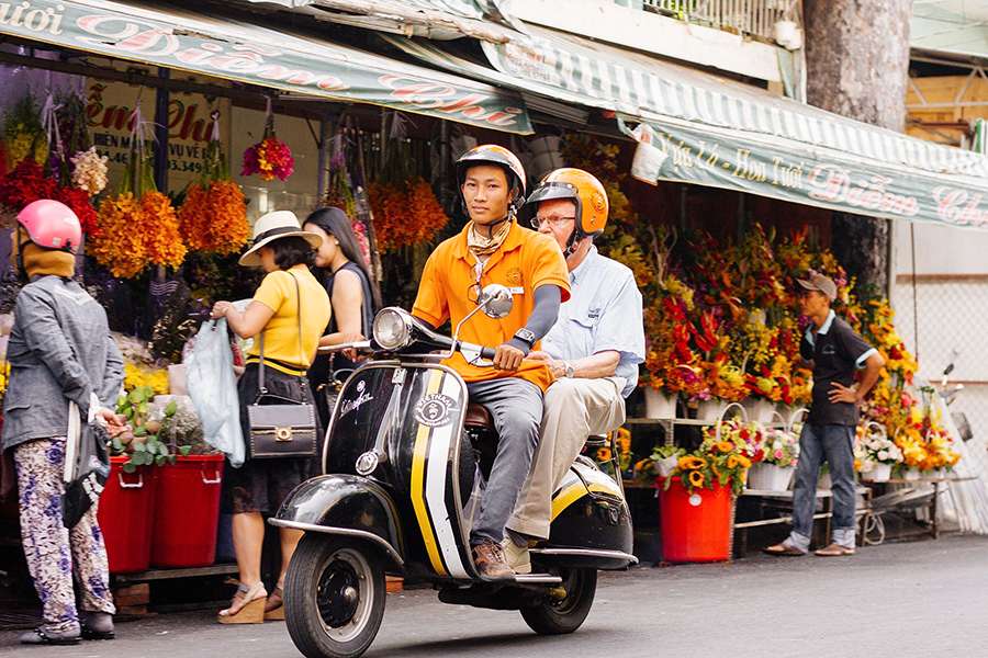 Explore the Insider of Ho Chi Minh City in the back of a Vespa